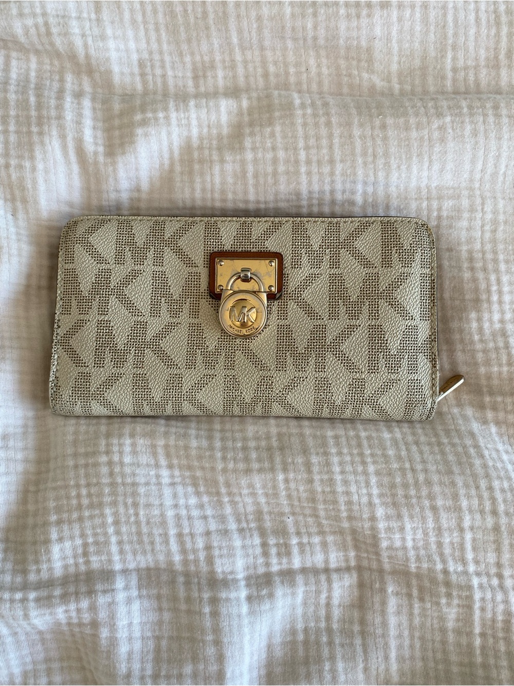 Michael Kors cream MK Monogram Zip Wallet with Gold Trim